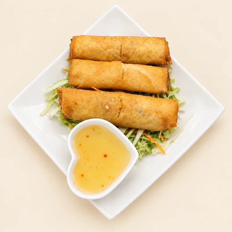 Crispy fried Vietnamese egg rolls with a fish-sauce dip